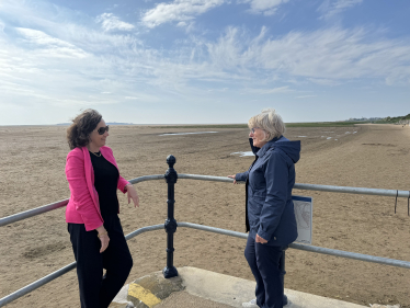 Jenny Johnson with former councillor Alison Wright at the newly raked beach at West Kirby